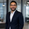 Yacine Meziane, startup entrepreneur smiling in office environment